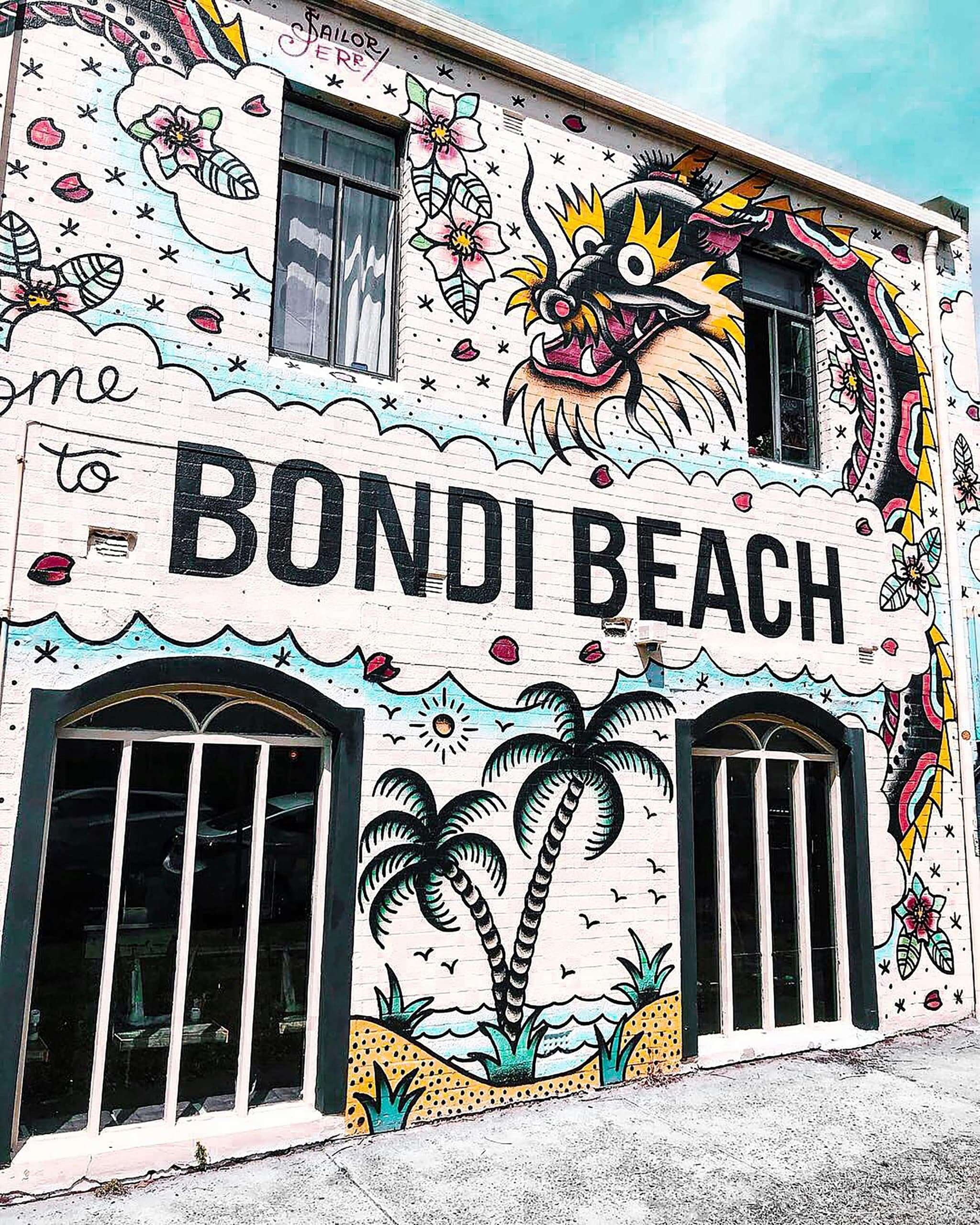 Hand-painted 'Bondi Beach' mural on a wall